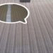 A picture of the floor with a speech bubble on it.