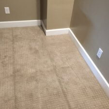 A room with carpet and walls in it